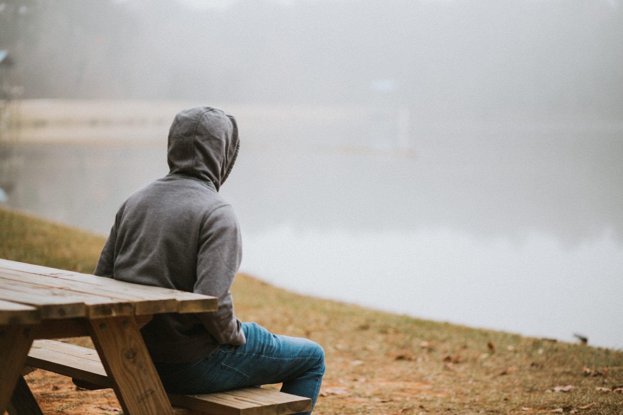 woman on bench face hidden