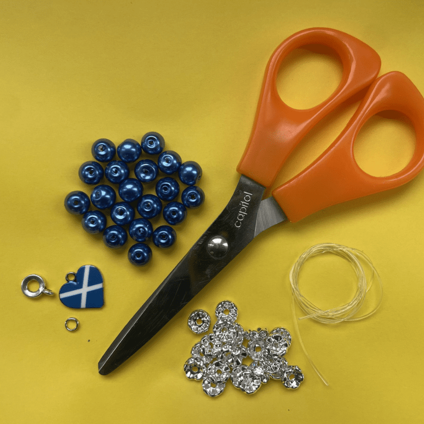 Beads, elastic and scissors