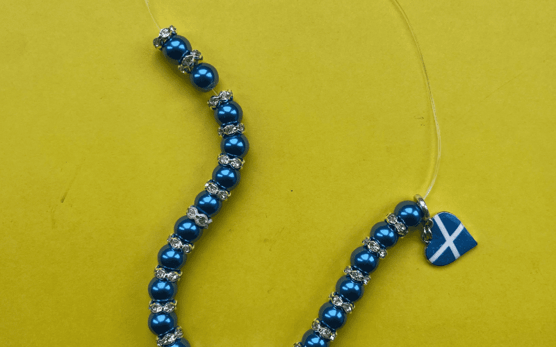 Beads with a charm.