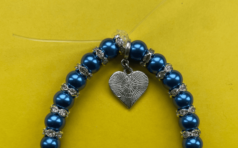 Beads tied with elastic.